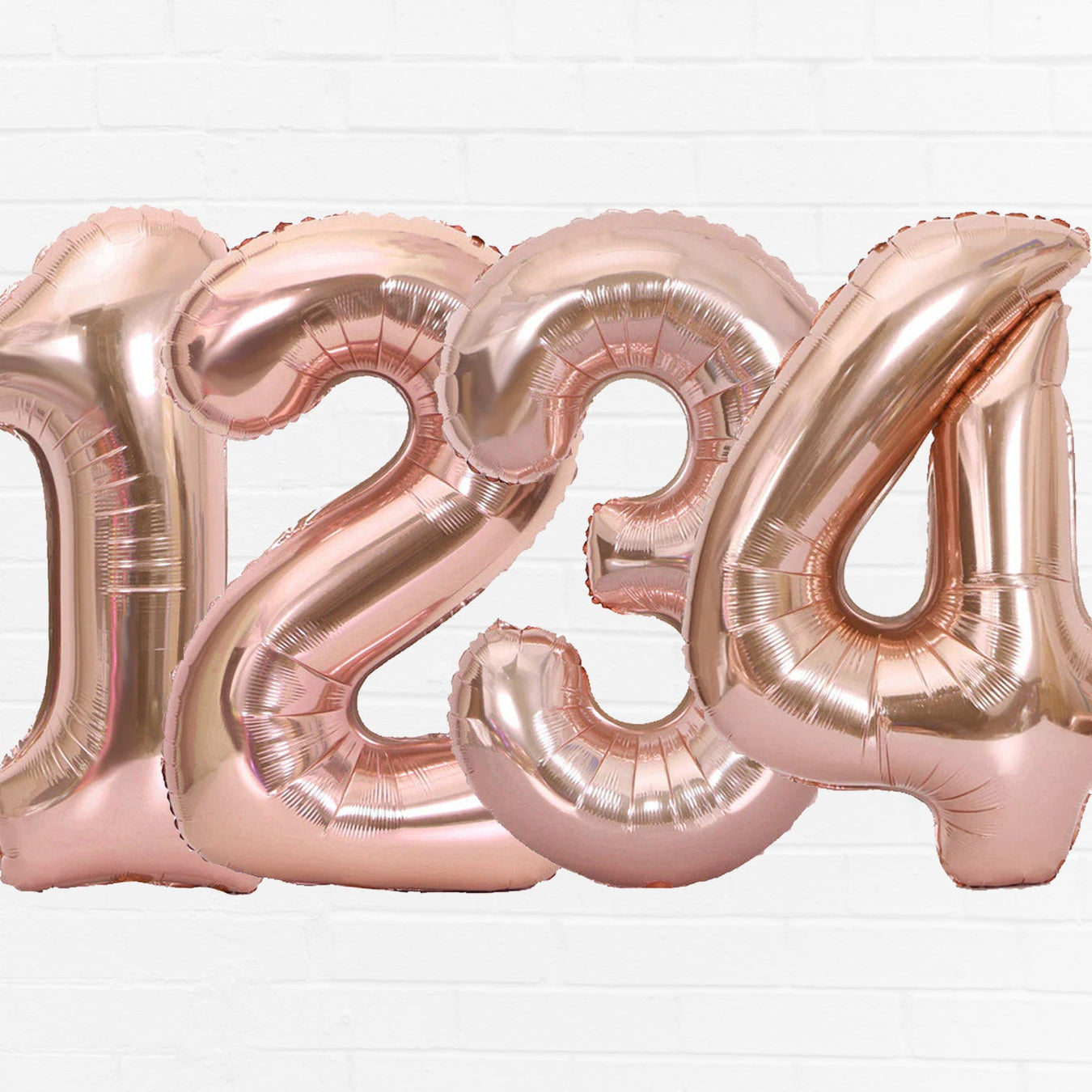 Zurchers.com Rose Gold Number Balloons Collection.