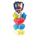Paw Patrol Chase character foil balloon on top of a bouquet with yellow, blue, and red latex balloons and multicolor star-shaped foil balloons.