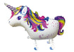 Colorful foil balloon shaped like a white unicorn with a spiral horn, rainbow mane and tail in purple, pink, blue, and yellow, and small feet, designed to walk when inflated.