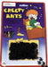 Creepy Ants toy package with purple and red cardboard showing a cartoon child in bed with black ant colony habitat visible in clear window display.