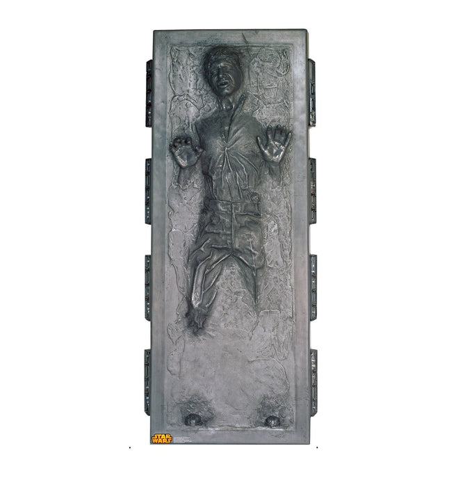 Gray metallic relief sculpture depicting a figure frozen in carbonite with hands raised, featuring ornate decorative borders on a rectangular panel with mounting hardware on the sides.