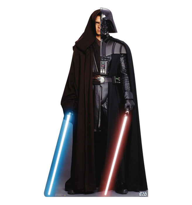 Life-size cardboard standup of a figure in black armor and cape holding illuminated blue and red lightsabers against a white background.