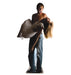 Lifesize cardboard standup featuring a shirtless man with dark hair holding a woman in a beige flowing dress, with an exaggerated excited expression on his face.