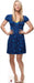 Woman with long blonde hair wearing a short-sleeved blue floral dress with gathered neckline, standing with hands on hips against a white background.