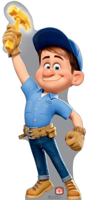 Cardboard standup of a cheerful cartoon character in a blue work shirt and cap, holding a glowing golden hammer above his head with a bright smile.