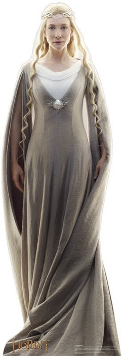 Full-length cardboard standup figure of a woman with long blonde wavy hair, wearing a flowing pale gray gown with white undergarment and ornate brooch, topped with an elaborate braided crown.
