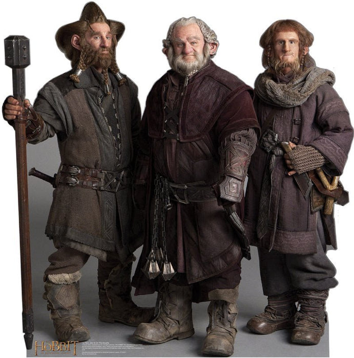 Three cardboard standups depicting bearded dwarf characters in medieval-style brown and burgundy clothing with leather armor, displayed against a white background.