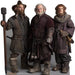 Three cardboard standups depicting bearded dwarf characters in medieval-style brown and burgundy clothing with leather armor, displayed against a white background.