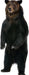 A life-size cardboard cutout of a brown bear standing upright on its hind legs with dark fur, lighter face, and front paws visible against a white background.
