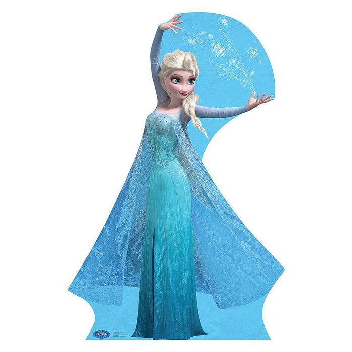 Life-size cardboard standup of Elsa from Frozen wearing an icy blue sequined gown with a flowing cape, platinum blonde braid, and snowflake-adorned backdrop behind her.