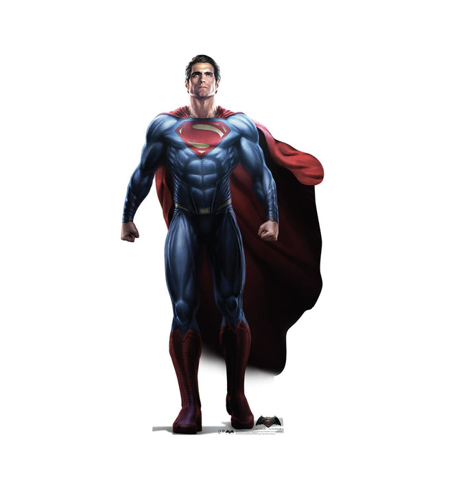 Superman in blue and red suit with red cape stands facing forward with determined expression against white background.