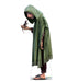 Lifesize cardboard standup of a character wearing a green hooded cloak with geometric patterns, burgundy pants, and sandals, holding a small rat, with "Encanto" branding visible at the bottom.