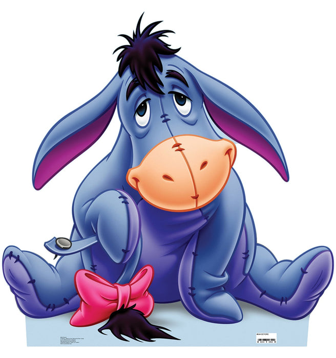 Blue plush donkey character with long drooping ears, orange muzzle, black spiky hair tuft, wearing purple outfit with pink bow, and stitched details throughout.
