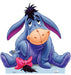 Blue plush donkey character with long drooping ears, orange muzzle, black spiky hair tuft, wearing purple outfit with pink bow, and stitched details throughout.