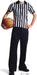 Person wearing black and white vertically striped referee shirt and black pants, holding a basketball with one hand on hip.