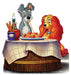 Cardboard standup featuring two animated dogs at a romantic dinner table with pasta, breadsticks, candle, and red-checkered tablecloth.