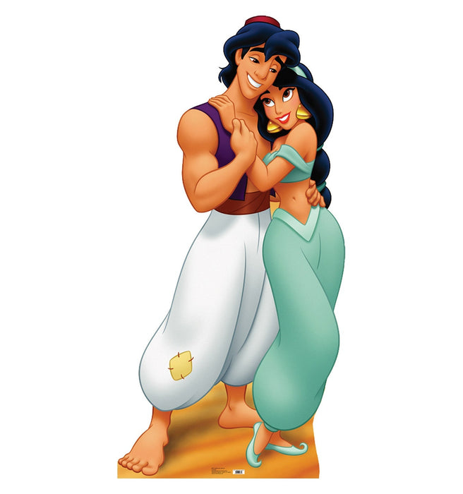 Cardboard standup cutout featuring Aladdin in a purple vest and white pants embracing Jasmine in a turquoise outfit, both smiling with a golden base.