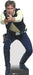 Cardboard standup figure of a man in a cream-colored shirt and dark vest pointing a blaster pistol, wearing a blue jean utility belt and black boots.