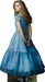Young woman with long curly blonde hair wearing a blue puffy ball gown dress with puffed sleeves and decorative embroidery at the hem, standing against a white background.