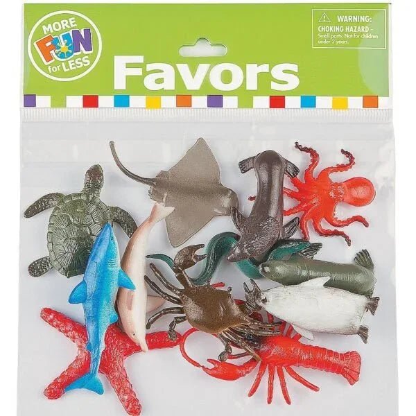 Assorted plastic ocean animal figurines in a clear package including a sea turtle, manta ray, shark, octopus, fish, and crustaceans in various colors displayed on a green "More Fun for Less Favors" branded packaging.