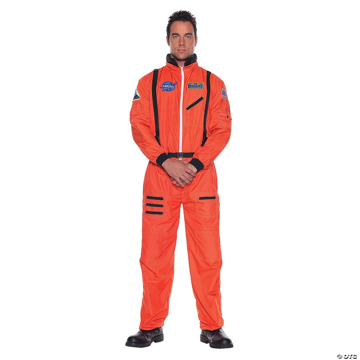 Man wearing a bright orange full-body NASA astronaut suit with black trim, shoulder patches, chest emblem, and utility pockets, styled as a complete space explorer costume.