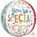 Colorful spherical foil balloon with "you're SPECIAL" in multicolored letters, surrounded by stars, dots, and ribbon streamers in blue, orange, green, and red.
