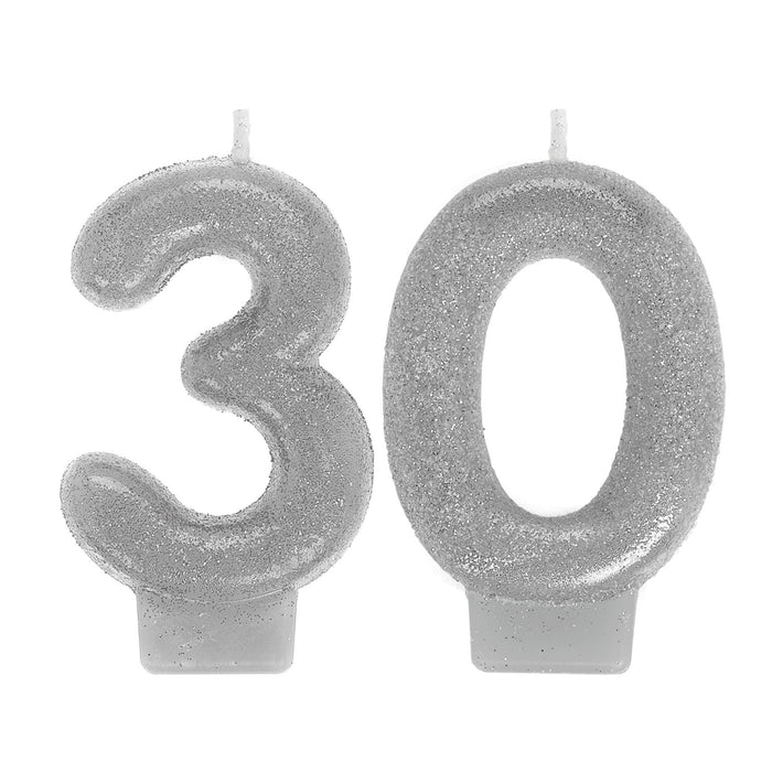 Sparkling Celebration numeral candles featuring silver glitter number 3 and 0 designed as a 30th birthday cake topper.