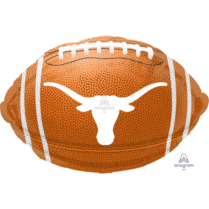 Orange football-shaped foil balloon with white laces and the University of Texas Longhorns logo in white at center.