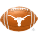 Orange football-shaped foil balloon with white laces and the University of Texas Longhorns logo in white at center.