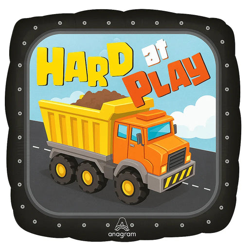 Square mylar balloon featuring a bright orange dump truck with yellow wheels carrying a yellow cargo bed against a blue sky, with "Hard at Play" text in yellow and orange lettering.