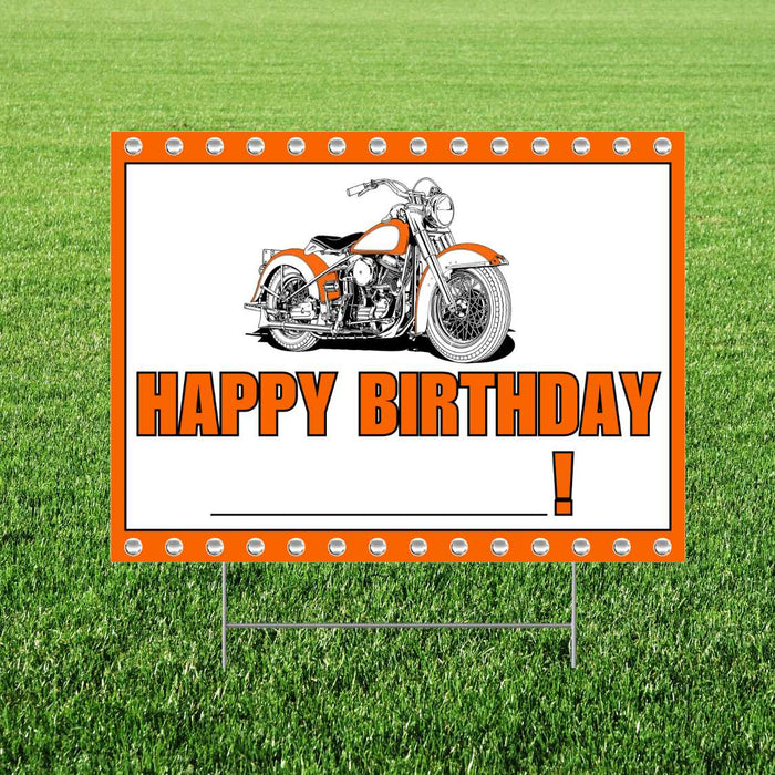Orange and white yard sign with an illustration of a vintage orange motorcycle, "HAPPY BIRTHDAY" text in orange, and a blank line for personalization, featuring silver rivets around the border.