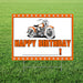 Orange and white yard sign with an illustration of a vintage orange motorcycle, "HAPPY BIRTHDAY" text in orange, and a blank line for personalization, featuring silver rivets around the border.
