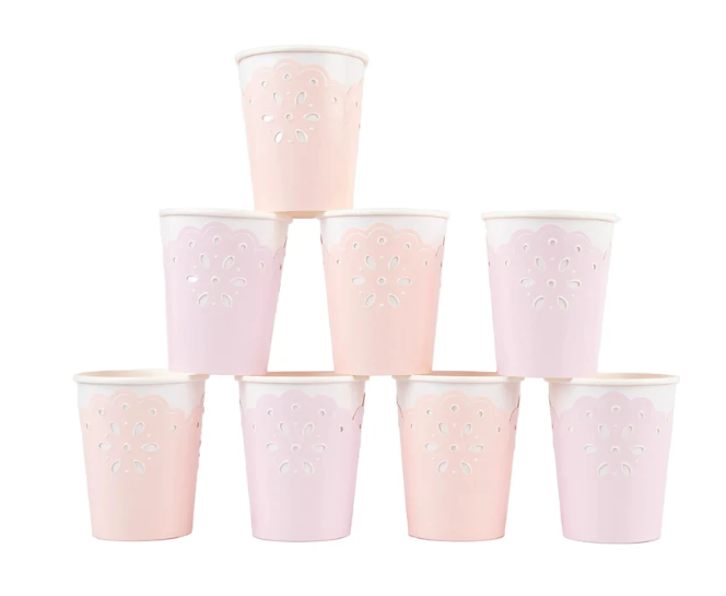 Broderie Anglaise pink and peach paper cups with delicate floral cutout details.
