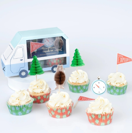 Camping Adventure Cupcake Kit with woodland-themed cupcake toppers including trees, bears, explorer flags, and compass designs.