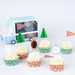 Camping Adventure Cupcake Kit with woodland-themed cupcake toppers including trees, bears, explorer flags, and compass designs.