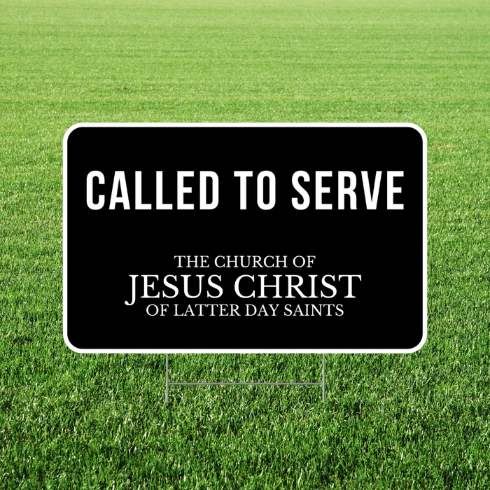 Black sign with 'Called to Serve' text on a grass background