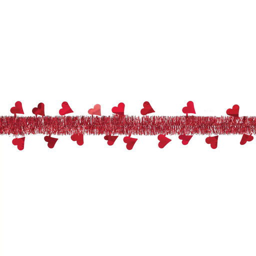 This Valentine's Day Tinsel Garland is a festive addition to any romantic celebration. Measuring 9 feet in length, it features a charming design of red hearts that will bring a touch of love and joy to any room. Perfect for decorating your home or event space, this garland is sure to spread the love this Valentine's Day.