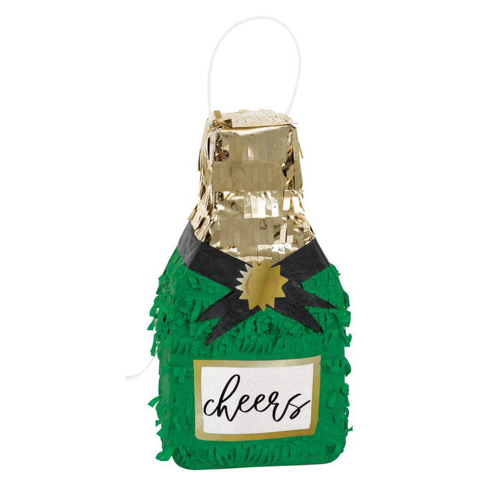 Mini champagne bottle piñata with green fringe, gold foil top, black bow accent, and “cheers” label on a white background.