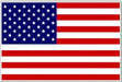 American flag featuring blue canton with white stars on left and red and white horizontal stripes on right, attached to a wooden stick.