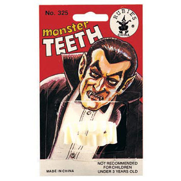 Monster Teeth / Blstr Card shown against a plain white background — a Halloween costume accessory.