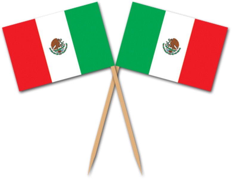 Two Mexican flags with red, white, and green stripes and central eagle emblems are crossed together on wooden picks.