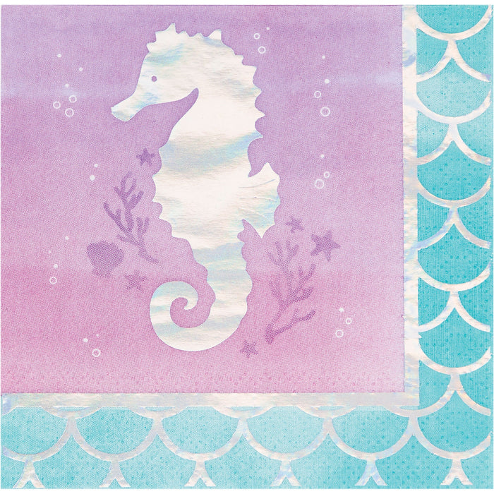 Mermaid Shine beverage napkin with a white seahorse silhouette, purple watercolor background, bubble accents, and teal mermaid-scale border.