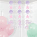 Mermaid Shine hanging cutouts with pastel shells, pink stars, mermaids, and seahorses displayed above pink and mint balloons.