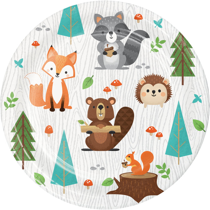 Wild One 7-inch paper plate with woodland animals, trees, leaves, mushrooms, and woodgrain details on a white background.
