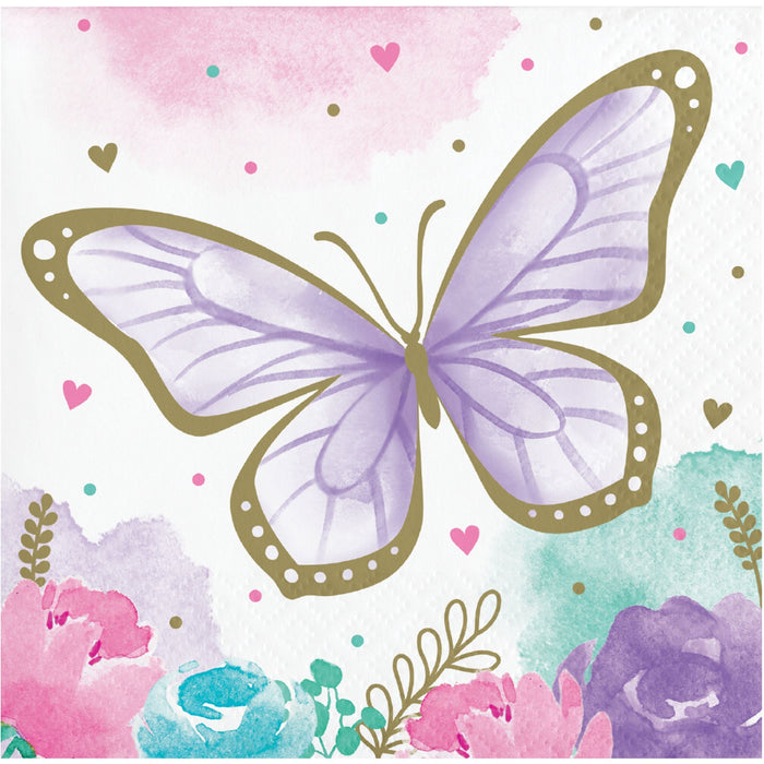 Butterfly Shimmer beverage napkin with a purple watercolor butterfly, gold outline details, pastel flowers, hearts, and confetti accents.