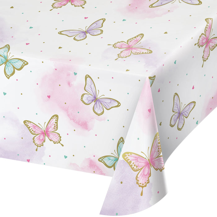 Butterfly Shimmer paper tablecover with pastel pink, purple, and teal butterflies, gold accents, watercolor washes, hearts, and confetti dots on a white background.