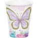 Butterfly Shimmer 9-ounce paper cup with a purple watercolor butterfly, gold outline details, pastel flowers, hearts, and confetti accents.