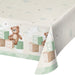 Teddy Bear paper tablecover with teddy bears, baby blocks, clouds, moons, stars, and soft green accents on a light background