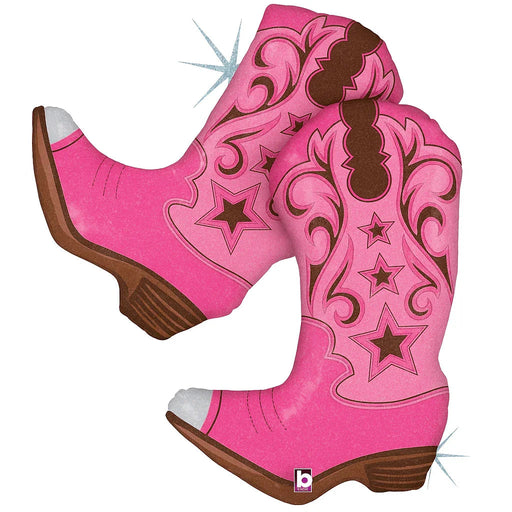 Bright pink foil balloon shaped like a pair of cowboy boots with brown decorative details, stars, and swirls, featuring sparkle accents on the heels.