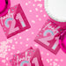 Turning Pink 21st birthday luncheon napkins in bright pink with large “21” design and confetti accents, styled on a pink party table with coordinating plates and décor, 16-count pack.
